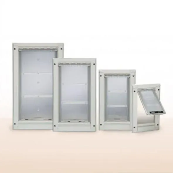 Four white pet doors of varying sizes, one partially open.