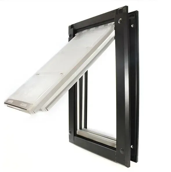 Black pet door with a white, hinged flap, installed in a wall.