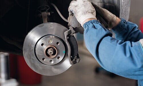 Mechanic Repairing Brake - Body Shop in Lima, OH