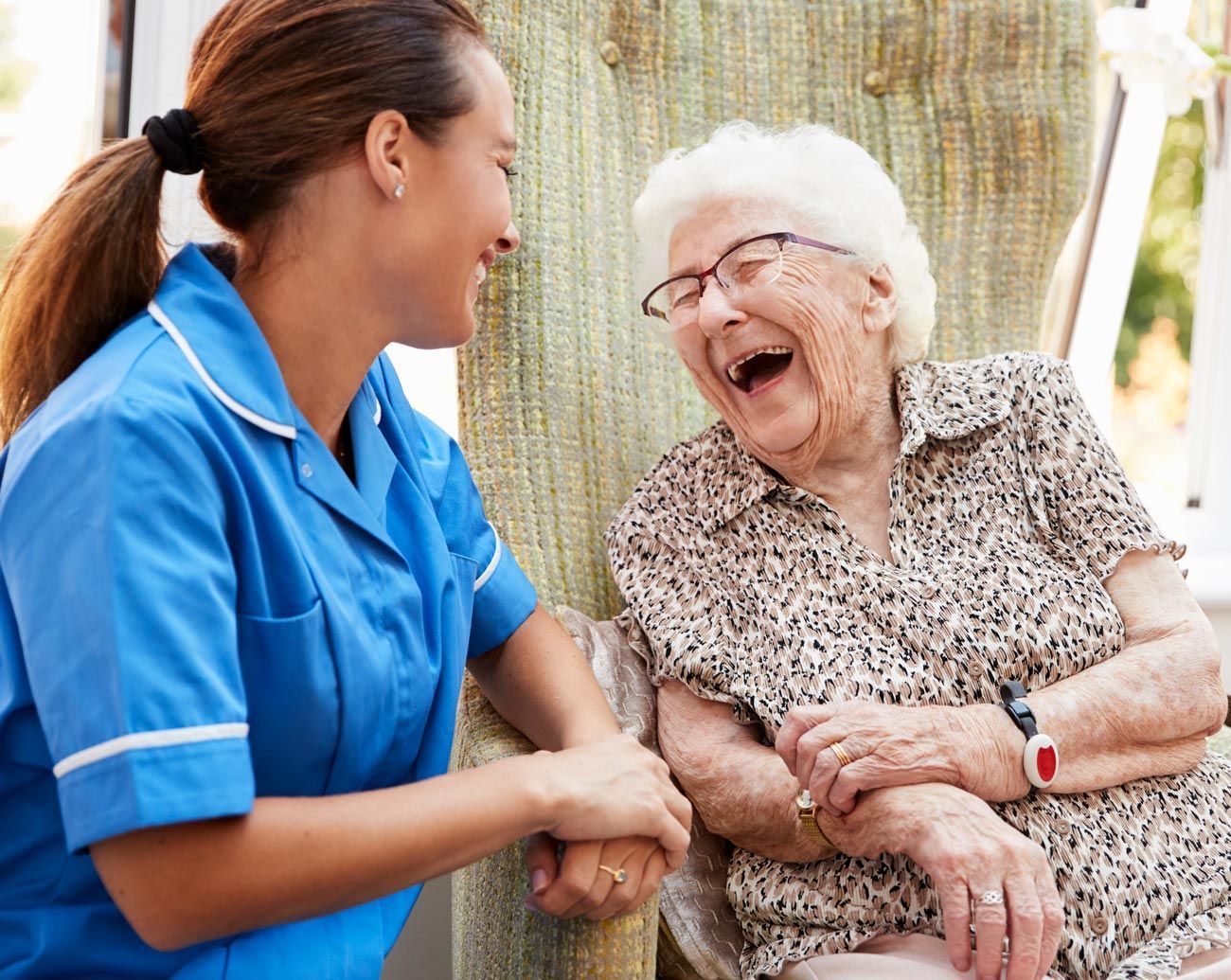 Woman Laughing With Senior Woman — Evergreen Park, IL — Excellent Home Health Care And Consulting LLC (EHHCCS)