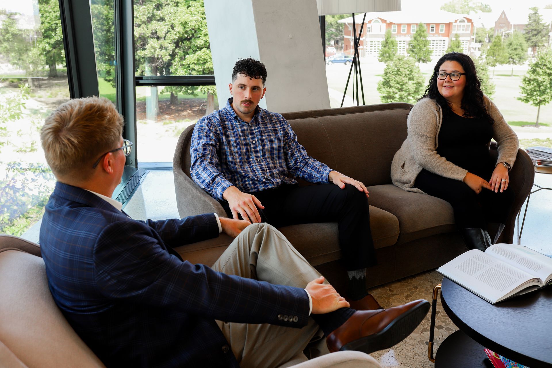 3 business people talking.