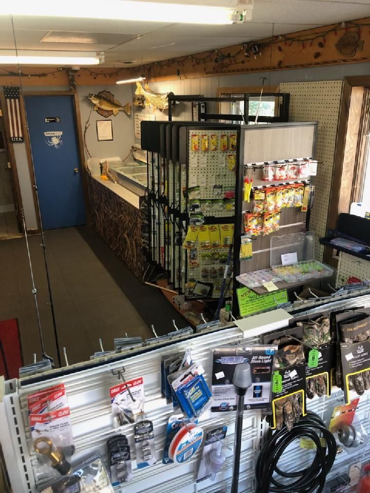 An aerial view of a fishing shop filled with fishing supplies.