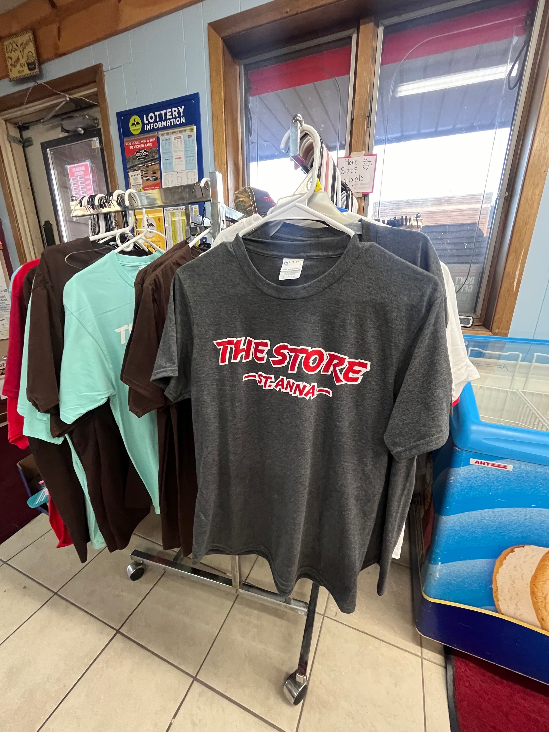 A t-shirt is hanging on a rack in a store.