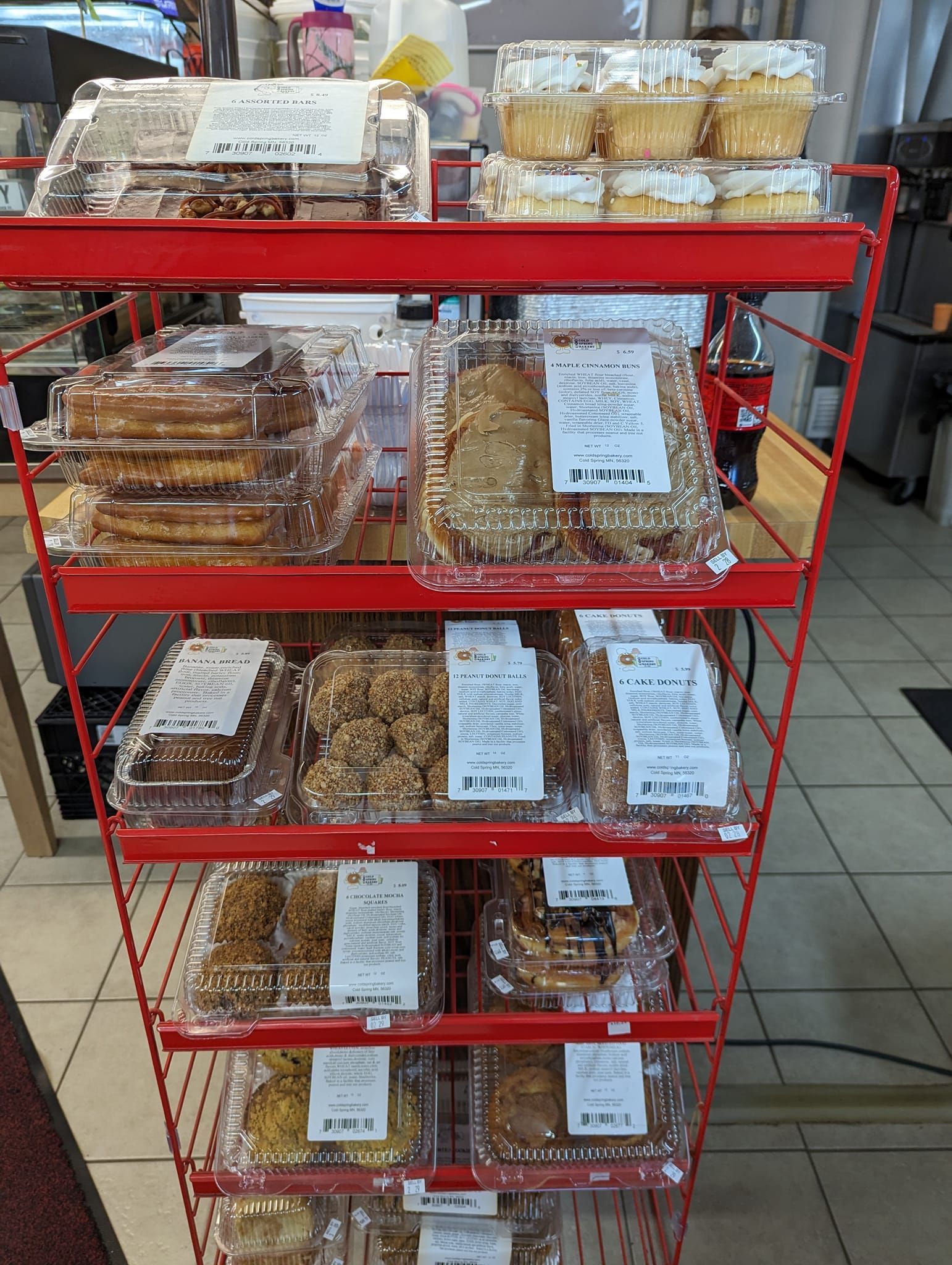 There are many different types of cookies on the shelves.