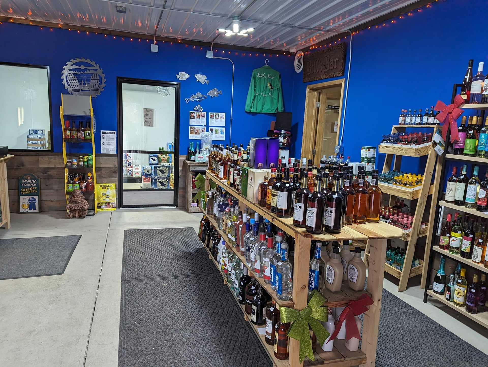 A store filled with lots of bottles of alcohol on shelves.