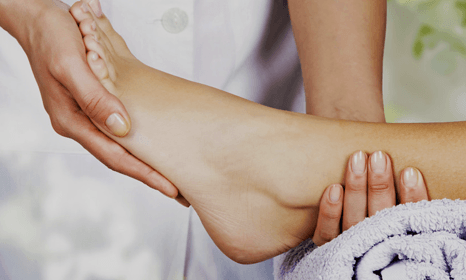 a clean foot being massaged