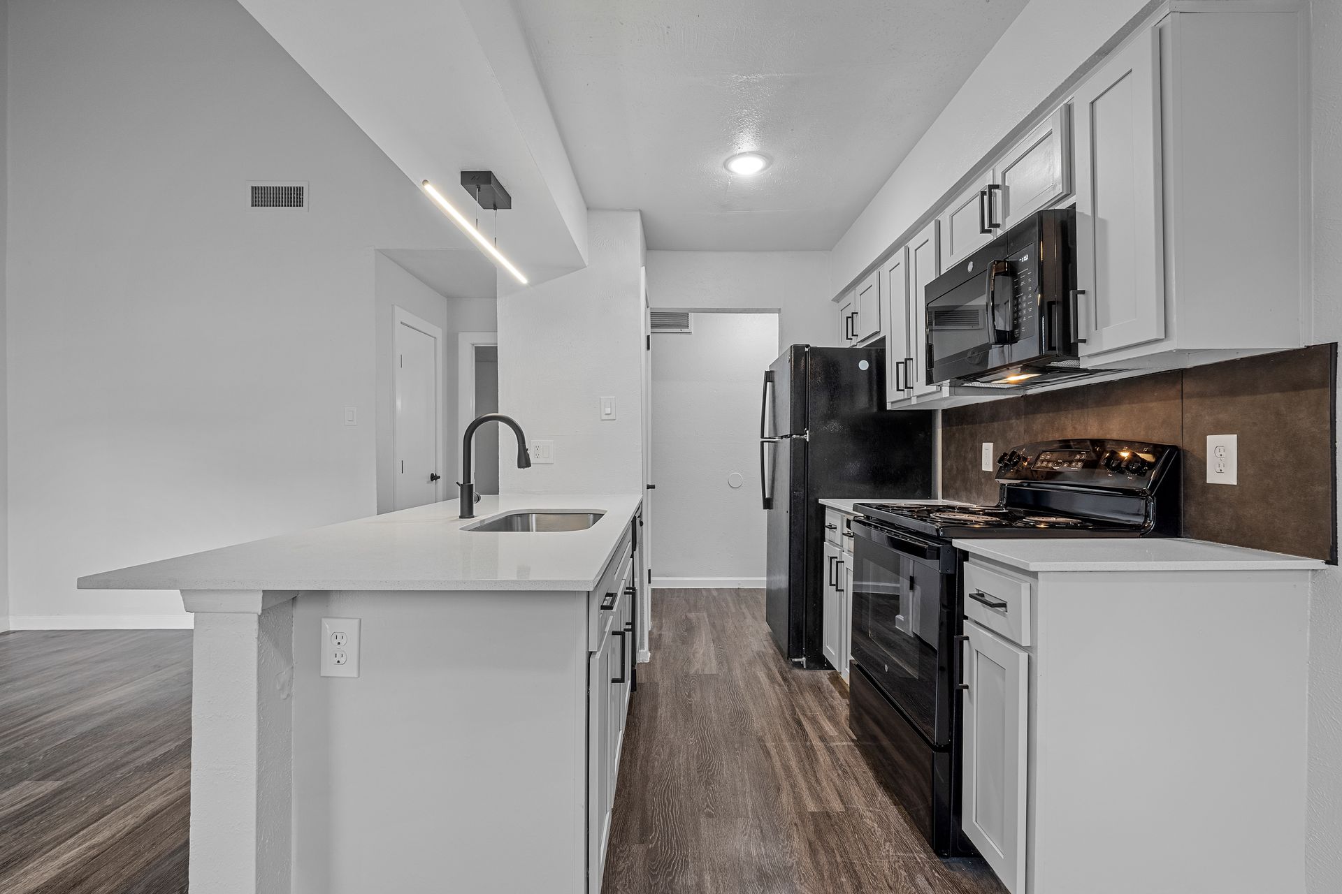 Photo showing a long kitchen