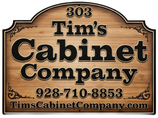 Wooden sign for Tim's Cabinet Company with logo, phone number, and website address.