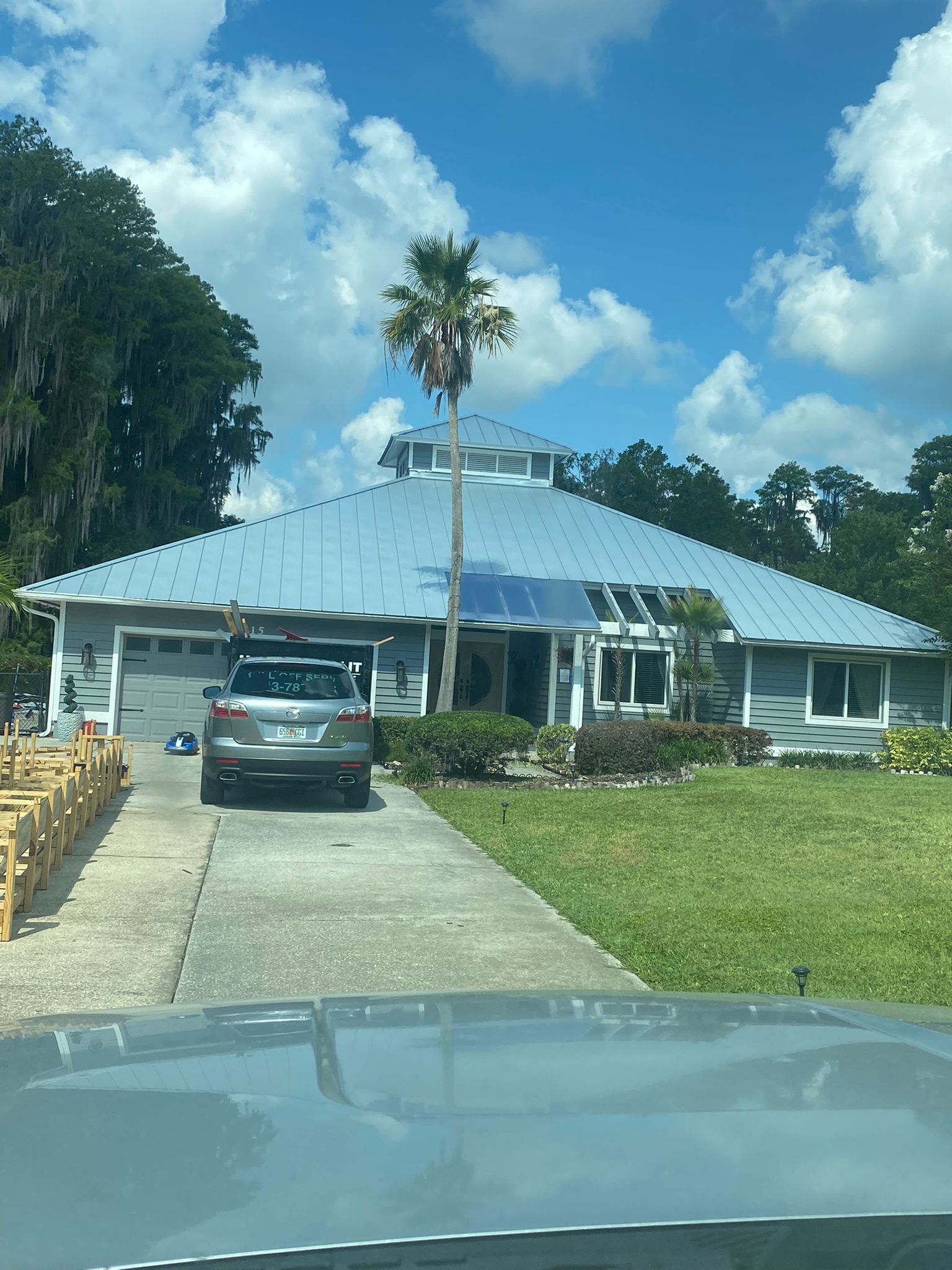 House with New Metal Roofing — Tampa, FL — Yowell’s Roofing