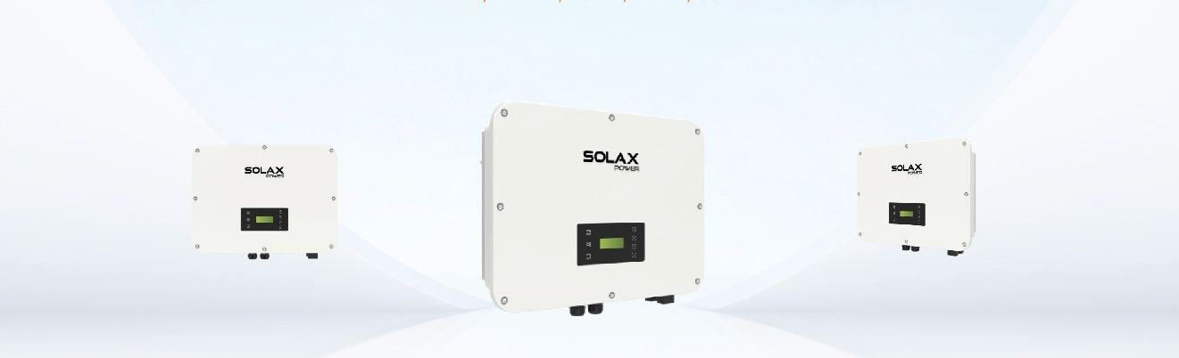 Three white solar inverters on gray bases against a light blue background.