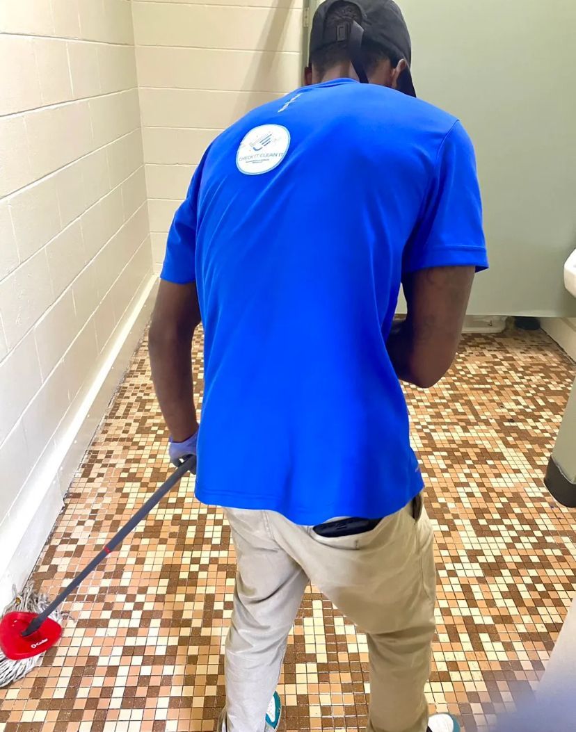 CheckItCleanIt employee is mopping a bathroom floor BEFORE/AFTER