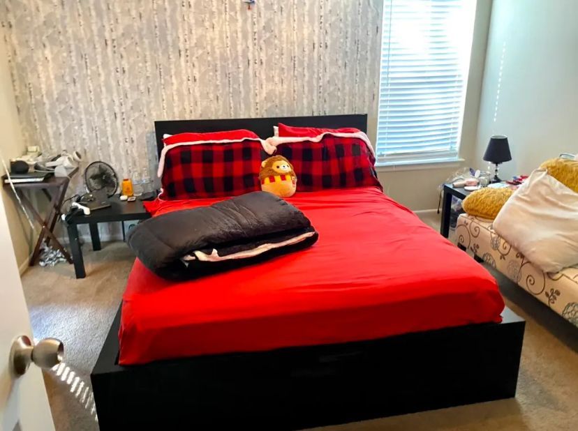 A bedroom with a bed and a couch in it BEFORE/AFTER