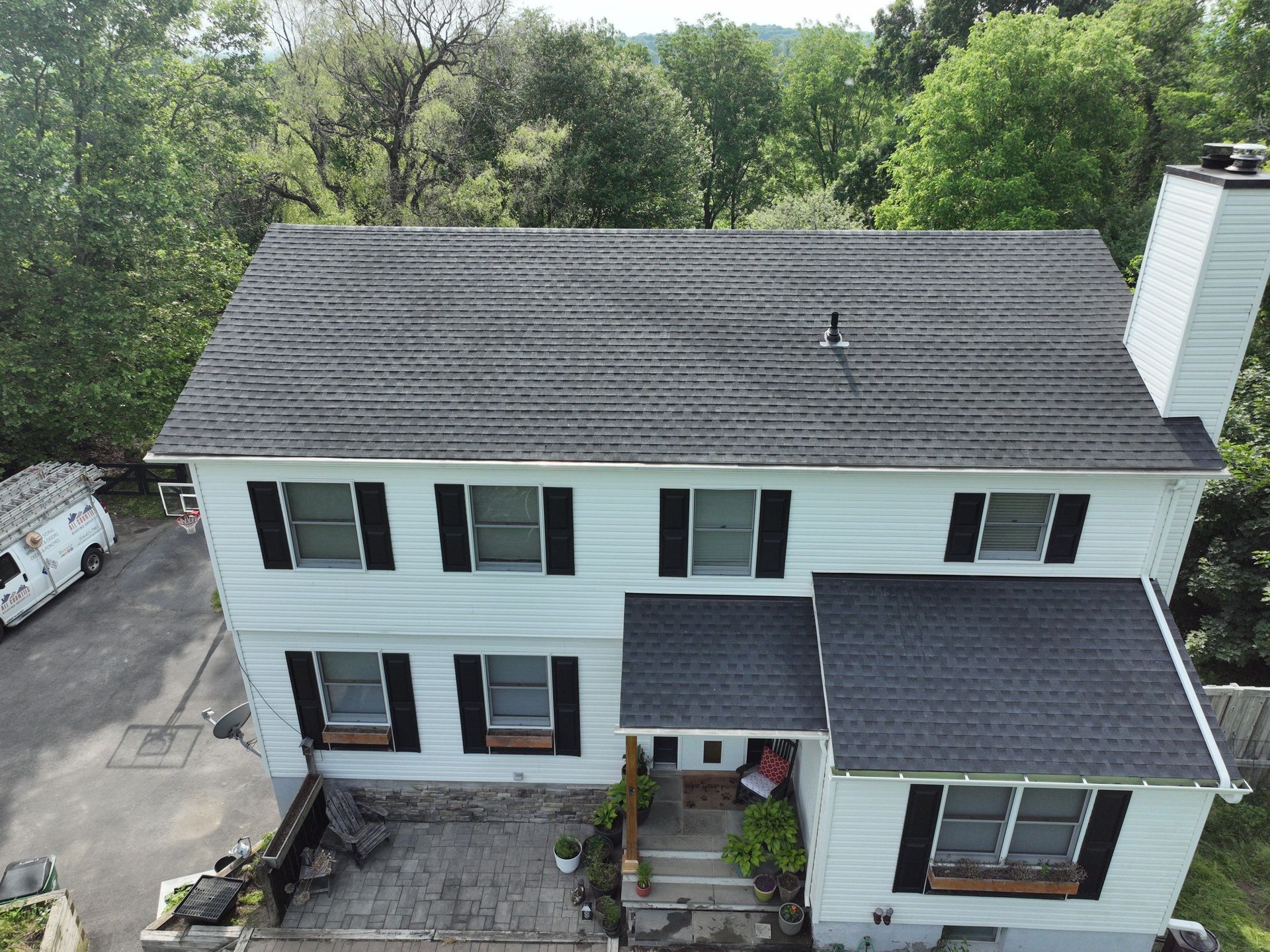 Black commercial asphalt roof replacement