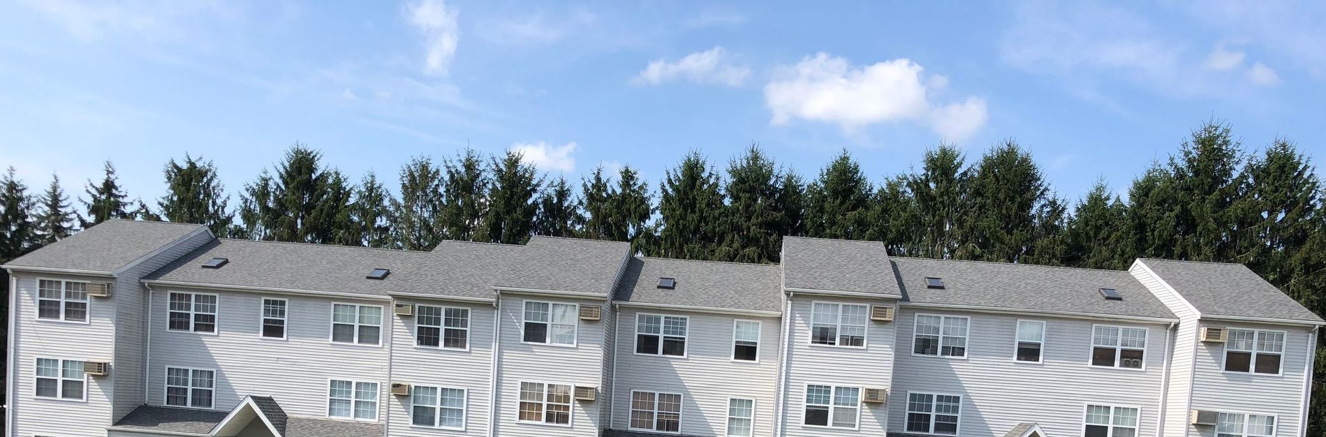Front view of commercial property with new roof