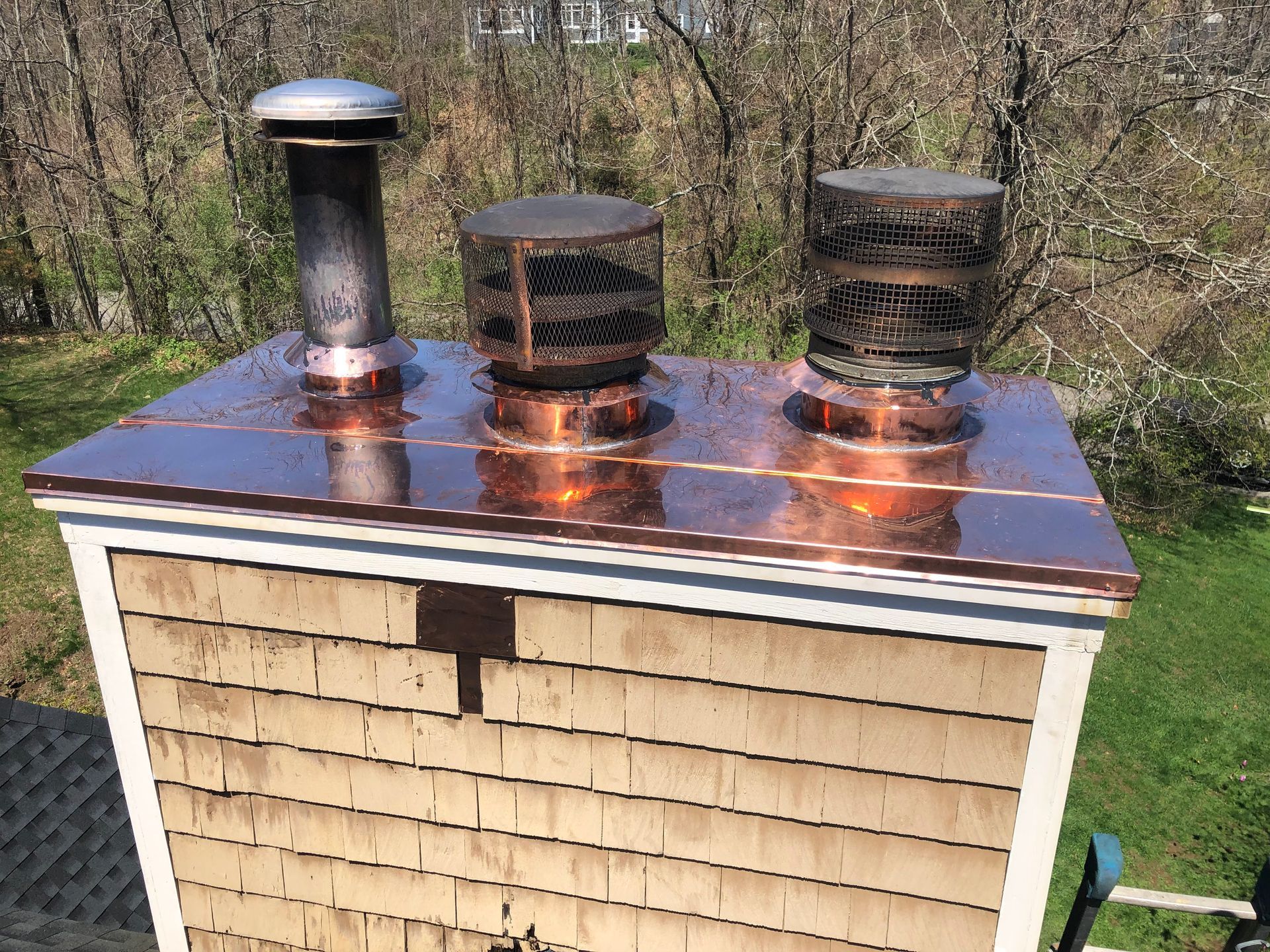 Completed copper work on top of fireplace