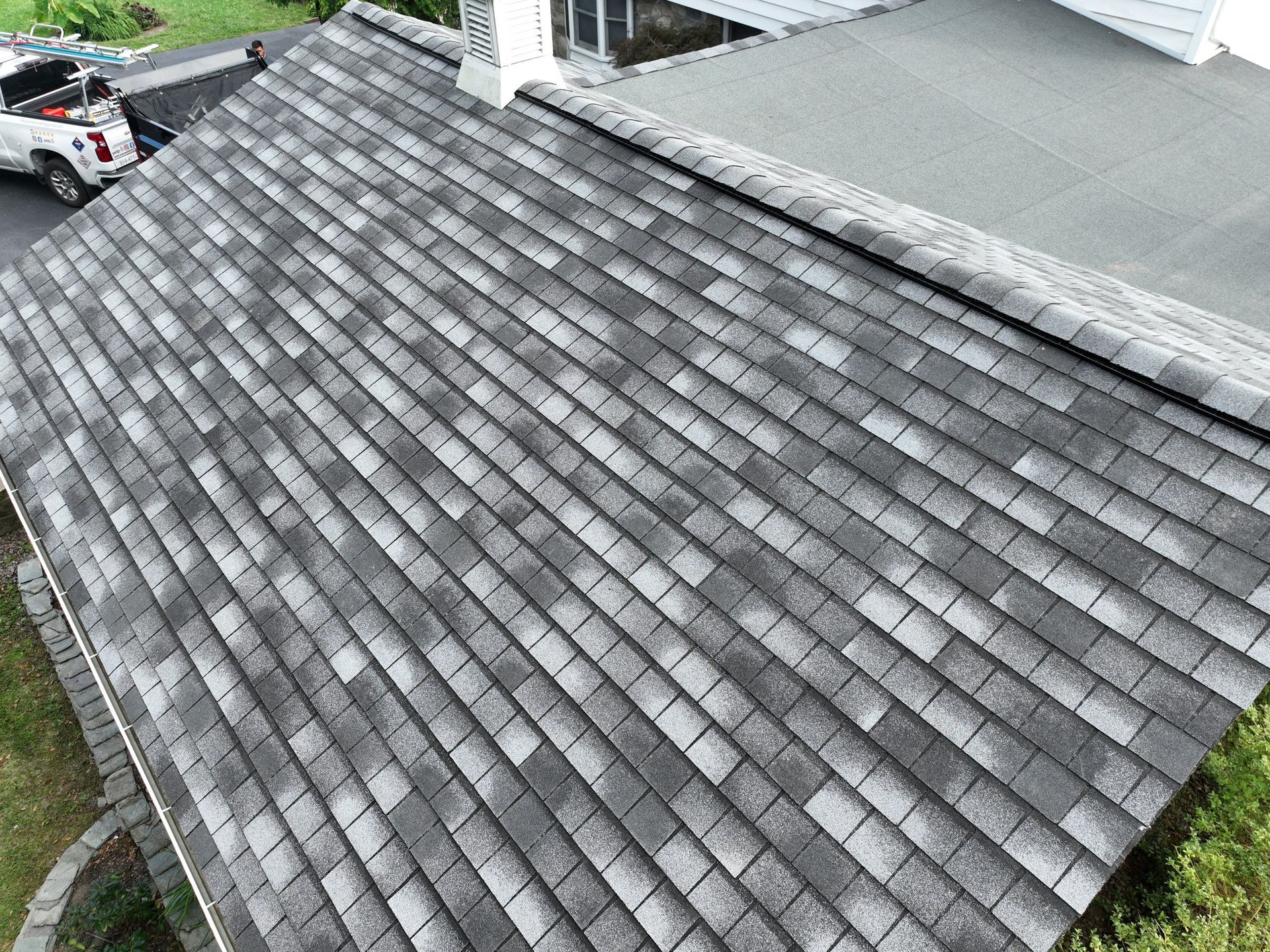 Gray and white tiled asphalt roof