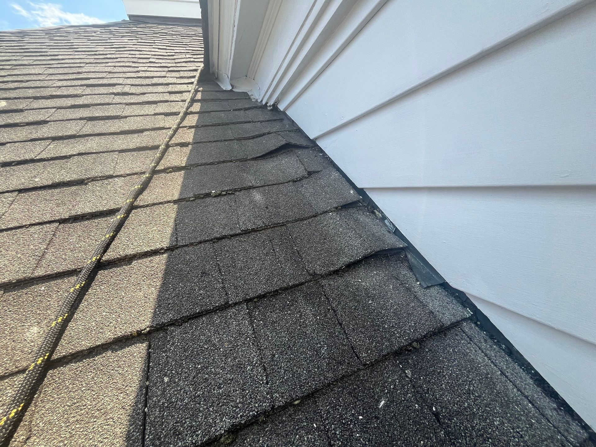 Shingles curling at roof inspection