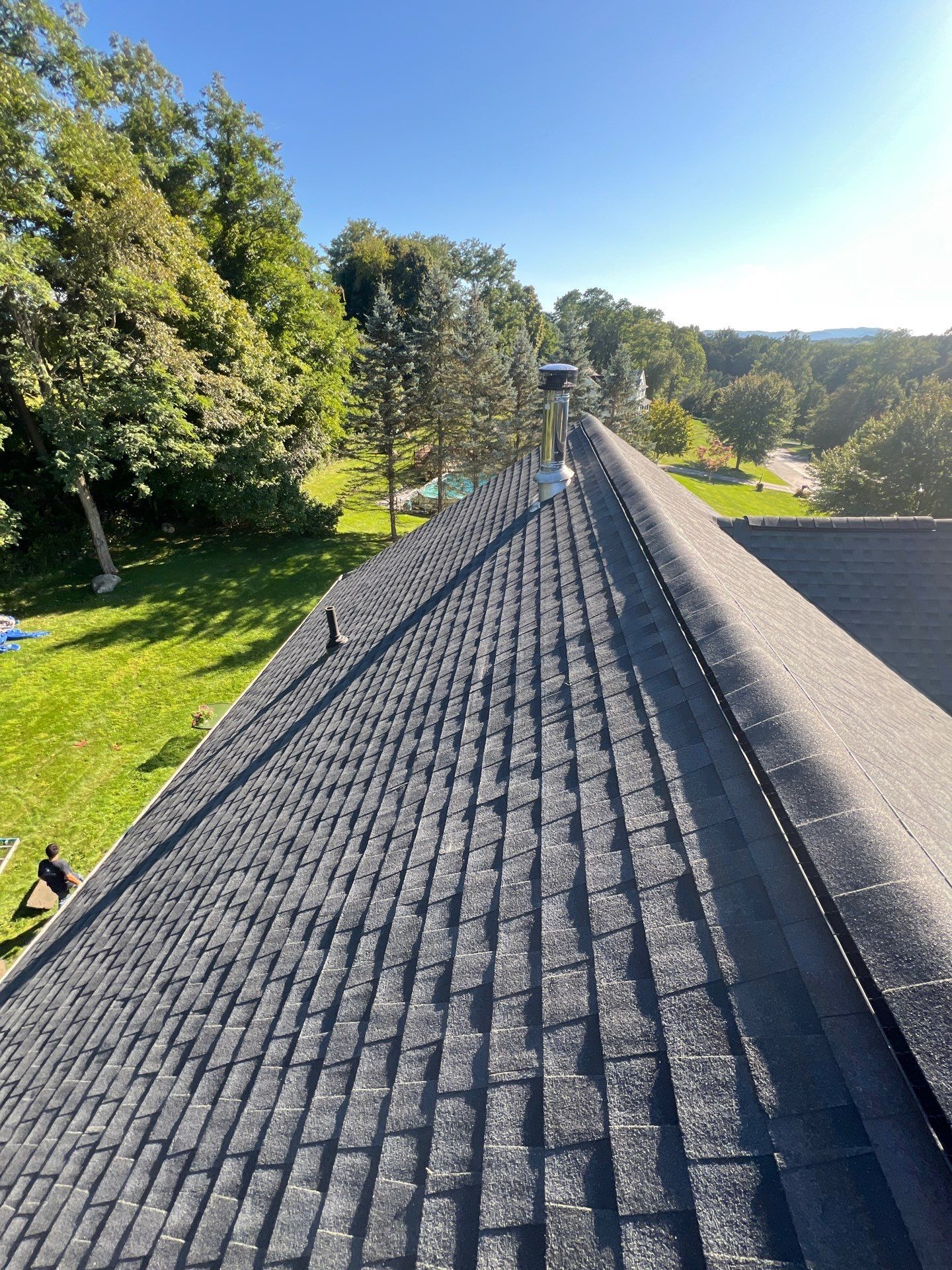 completed dark gray asphalt roof
