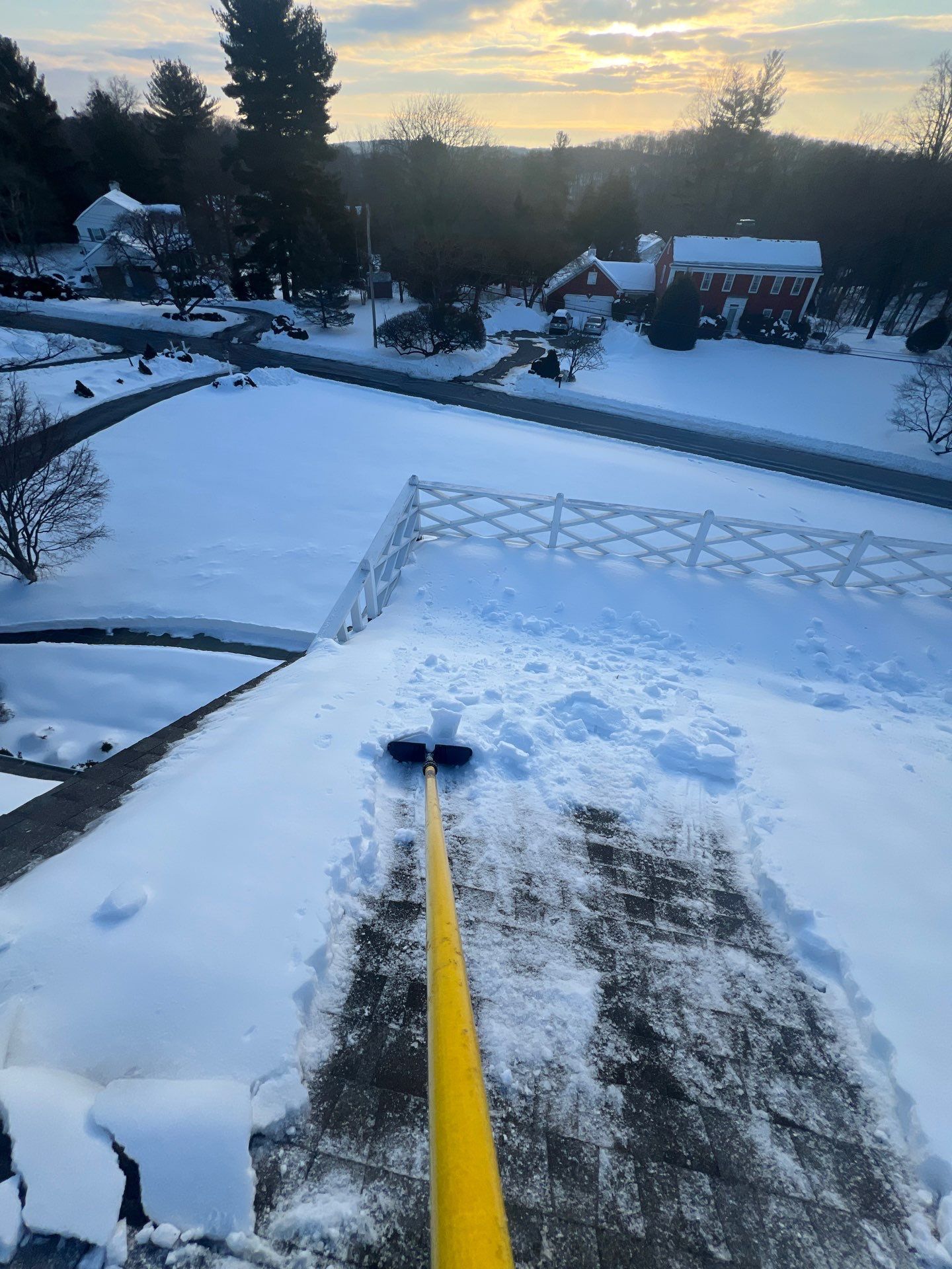 A roof with a new skylight installation 