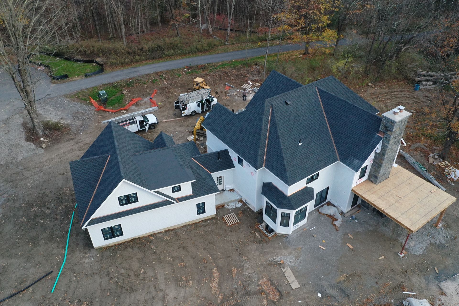 Far front view of new build with new roof and copper work