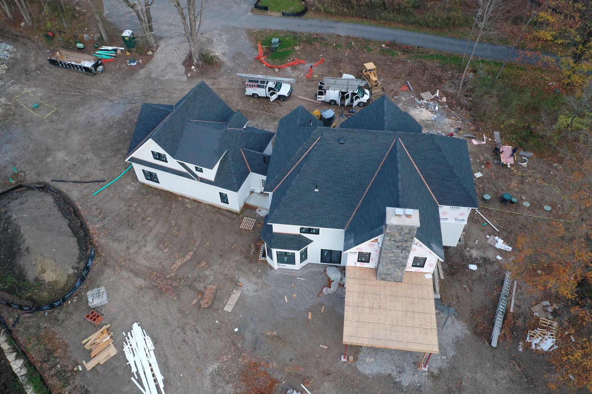 Far front view of new build with new roof and copper work