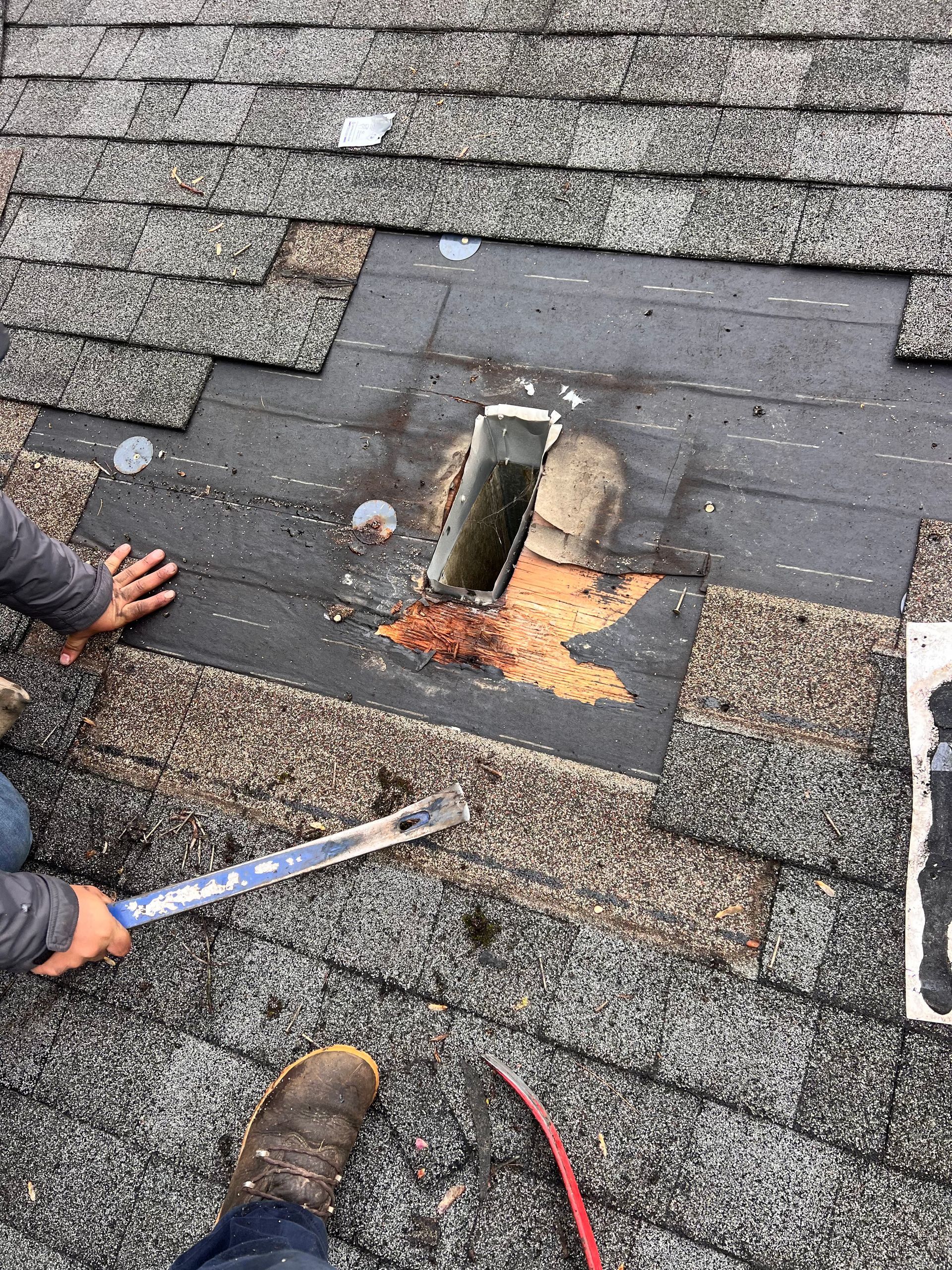 All Counties Roofing Group roofer is working on a roof repair
