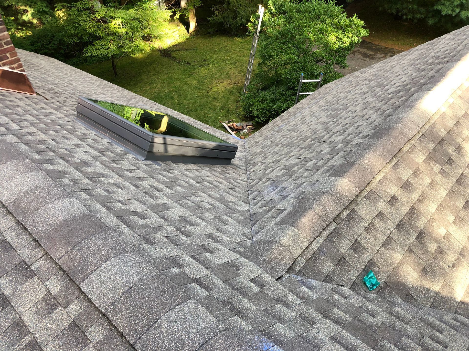 A roof with a new skylight installation