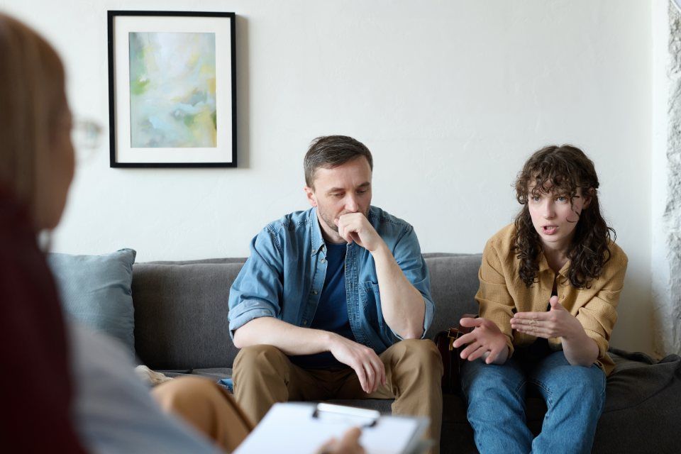 Woman talking about her relationship problems to psychologist