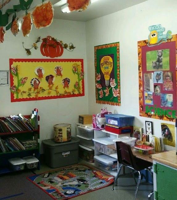 A room with a bulletin board that has a light bulb on it