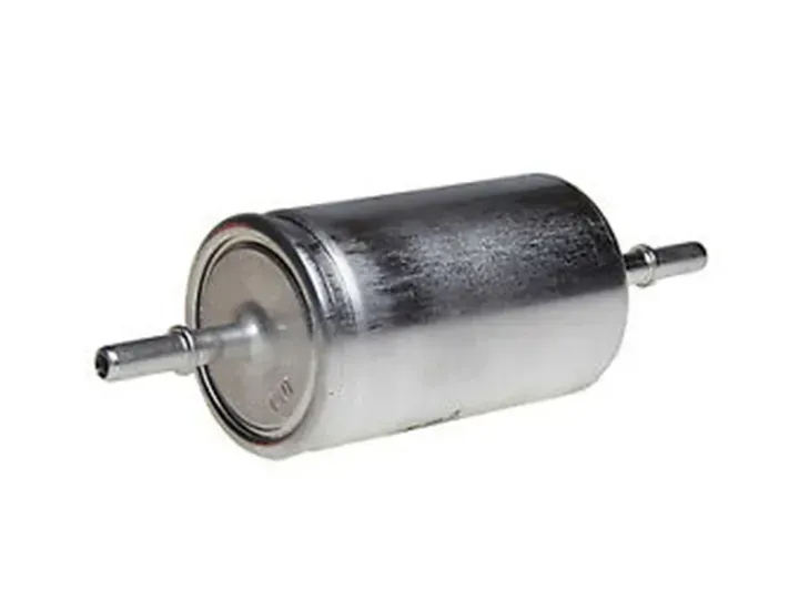 Green and black Interstate car battery with red and black terminals, white background.