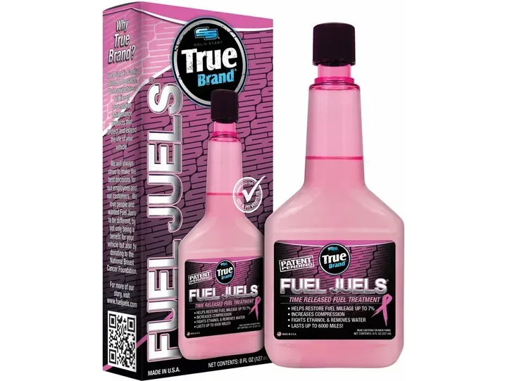 Pink bottle of True Brand Fuel Juels fuel treatment for breast cancer awareness.
