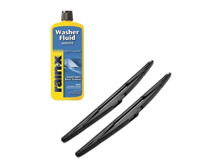 Bottle of blue and yellow windshield washer fluid and two black windshield wiper blades.