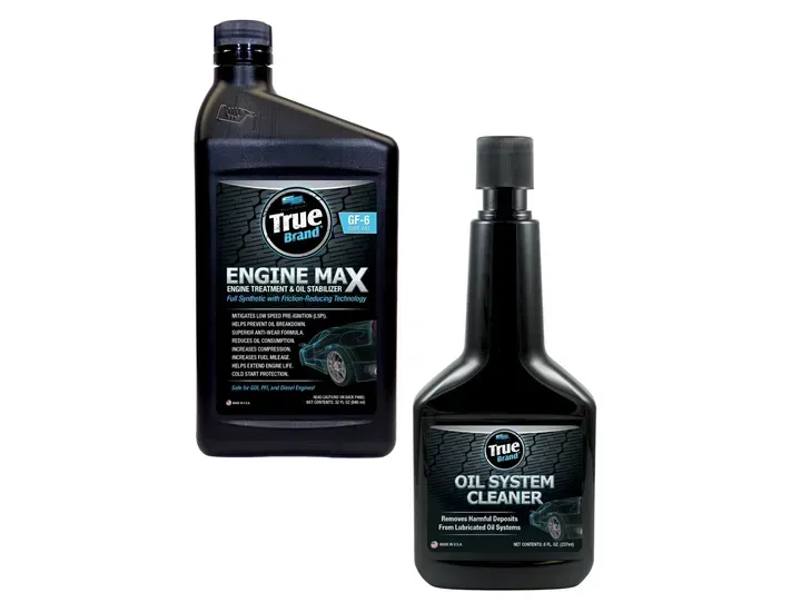Two black bottles of True Brand engine cleaner products.
