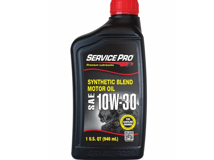 Black bottle of Service Pro 10W-30 synthetic blend motor oil with red cap.
