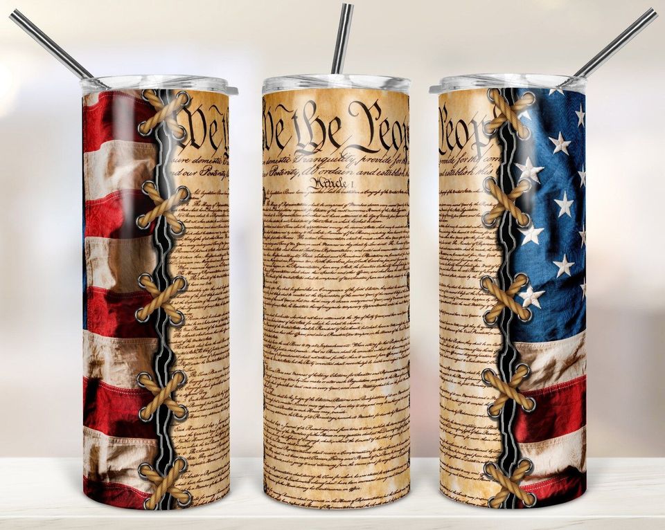 Three stainless steel tumblers with an american flag on them