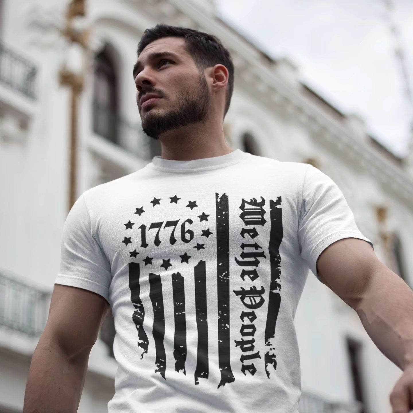 A man wearing a 1776 we the people t-shirt