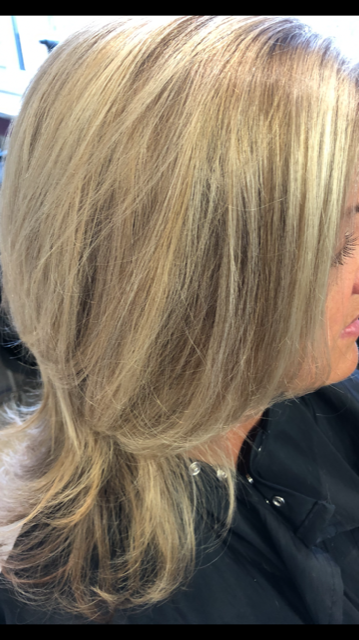 woman showing her colored hair