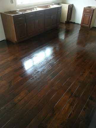 Dark finish wood floors — Flooring in Lansing, IL