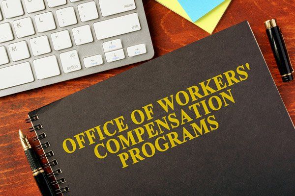 Workers Compensation Lawyer — Book with title Office of Workers' Compensation Programs in Redding, CA