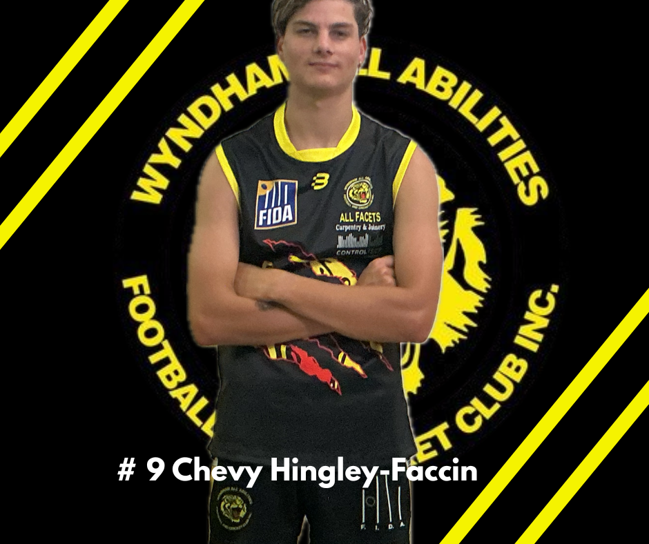 Chevy Hingley-Faccin, wearing a yellow and black Wyndham All Abilities Football Club uniform, stands with arms crossed.