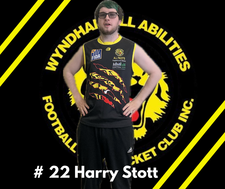 Harry Stott, #22, stands in a black and yellow Wyndhall All Abilities Football Club uniform with a team logo backdrop.