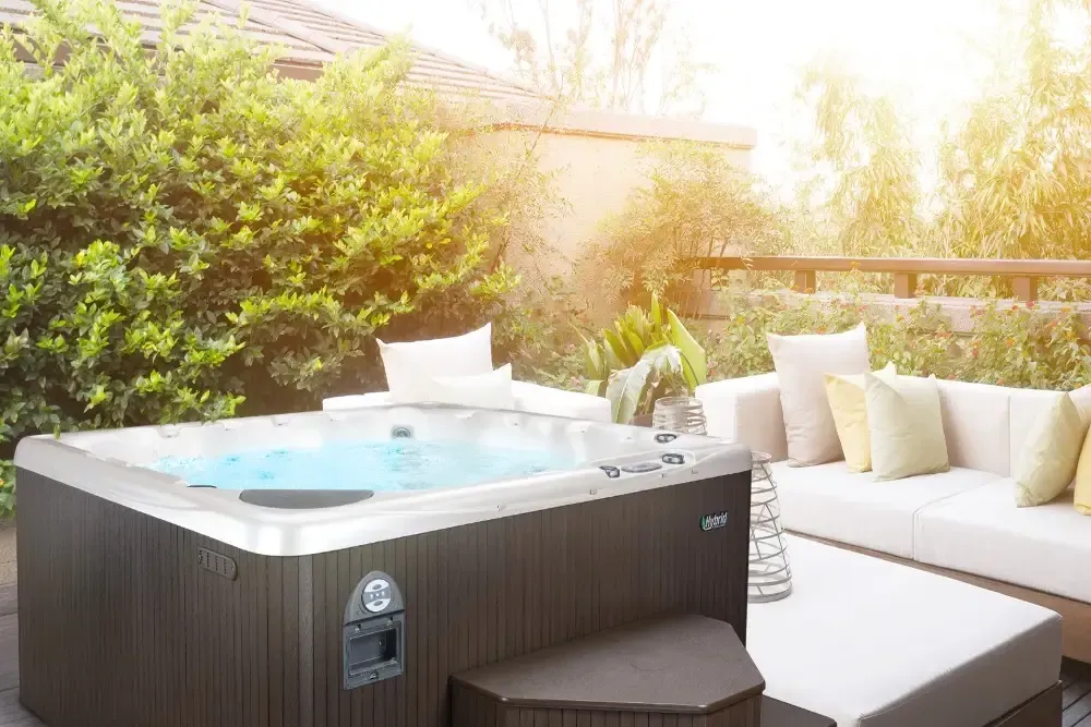 Hot tub maintenance service in backyard setting