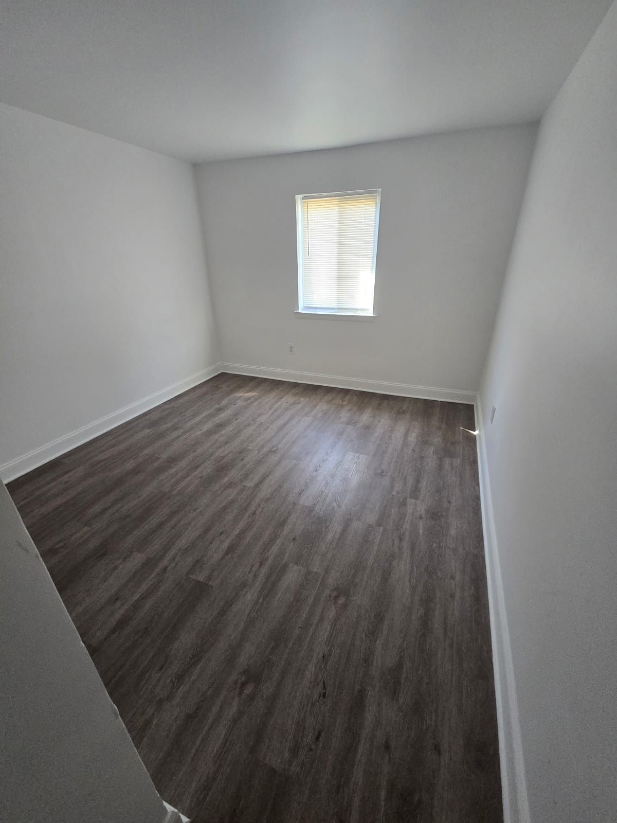 Bedroom with natural light and soft neutral tones at Chateau Apartments Burlington, NJ