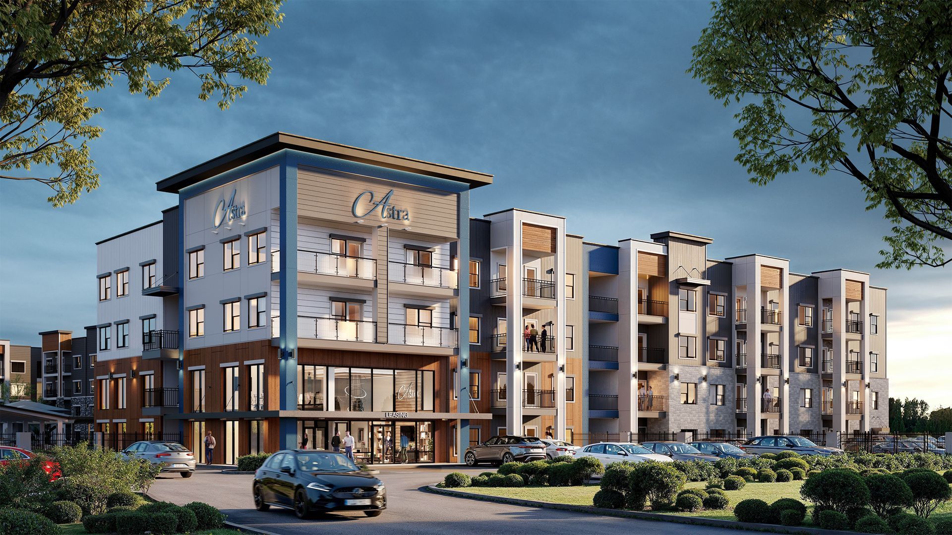 Exterior view of a modern multi-story apartment building with Astra signage and landscaped grounds.