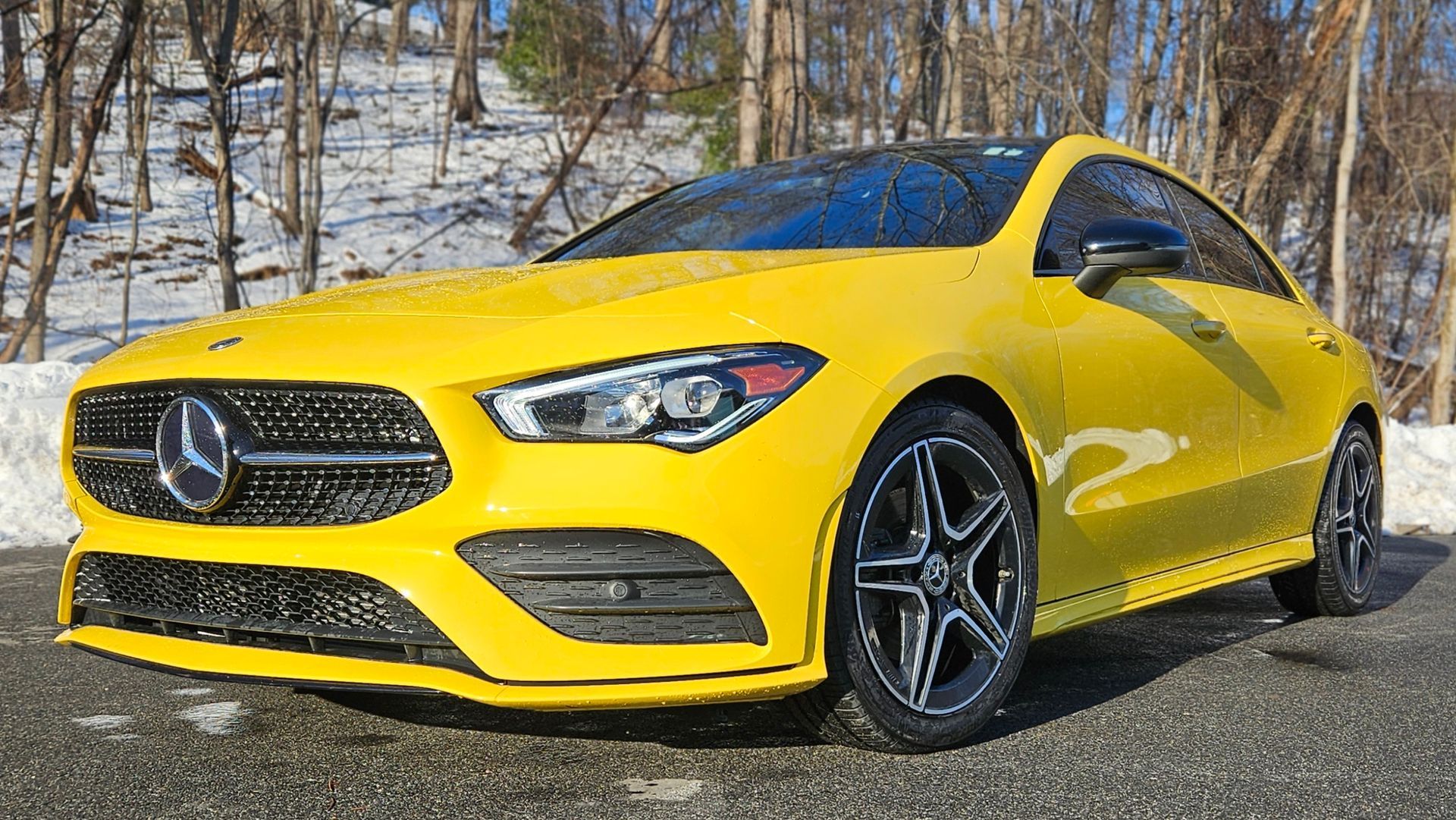 Bright yellow Mercedes-Benz CLA coupe 