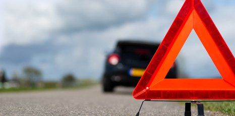 red triangle breakdown symbol