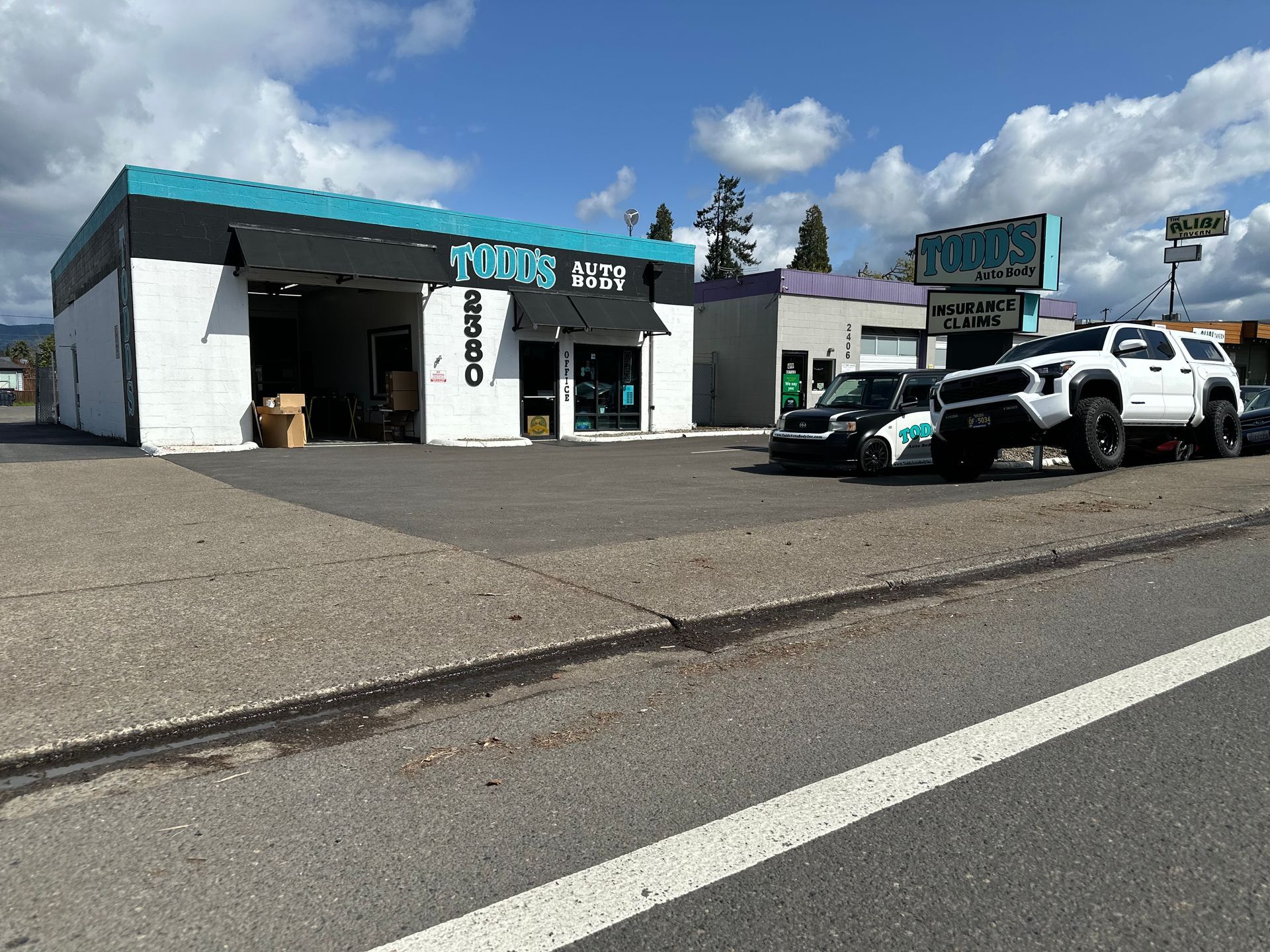 Auto Body Shop — Red Car in Springfield, OR Auto Body Shop — Red Car in Springfield, OR
