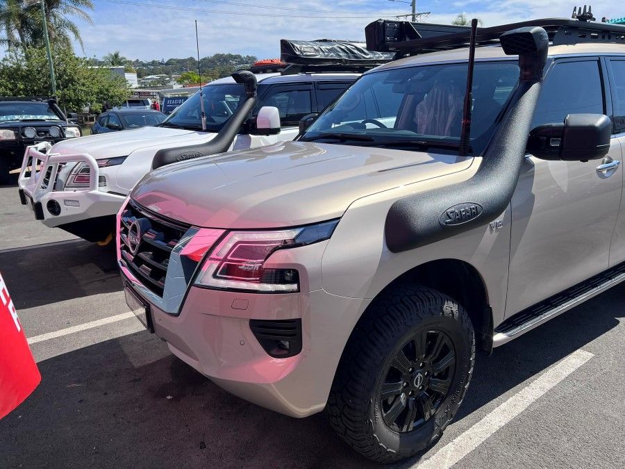 A Nissan Pathfinder With a Snorkel on the Hood is Parked in a Parking Lot — Rycam Automotive in Buderim, QLD