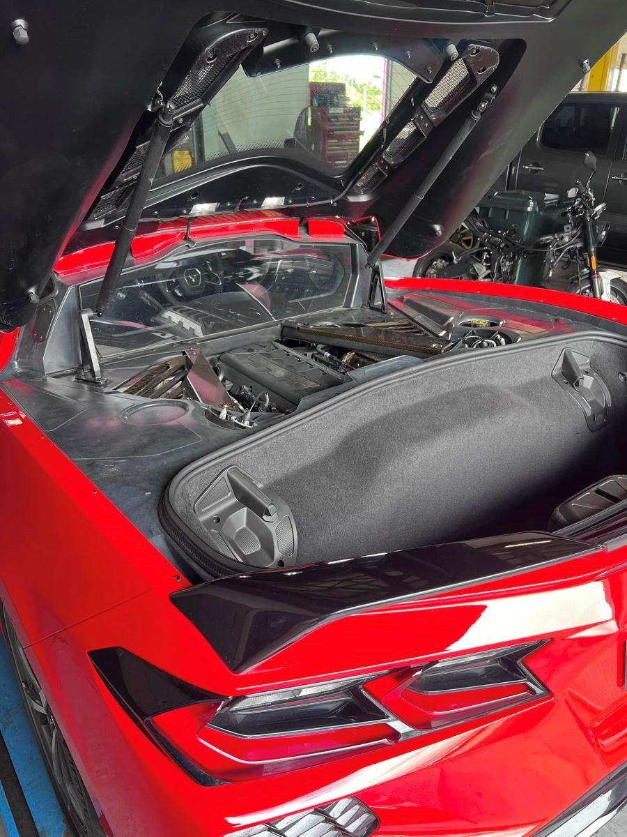 The Hood of a Red Sports Car is Open and the Engine is Visible — Rycam Automotive in Buderim, QLD