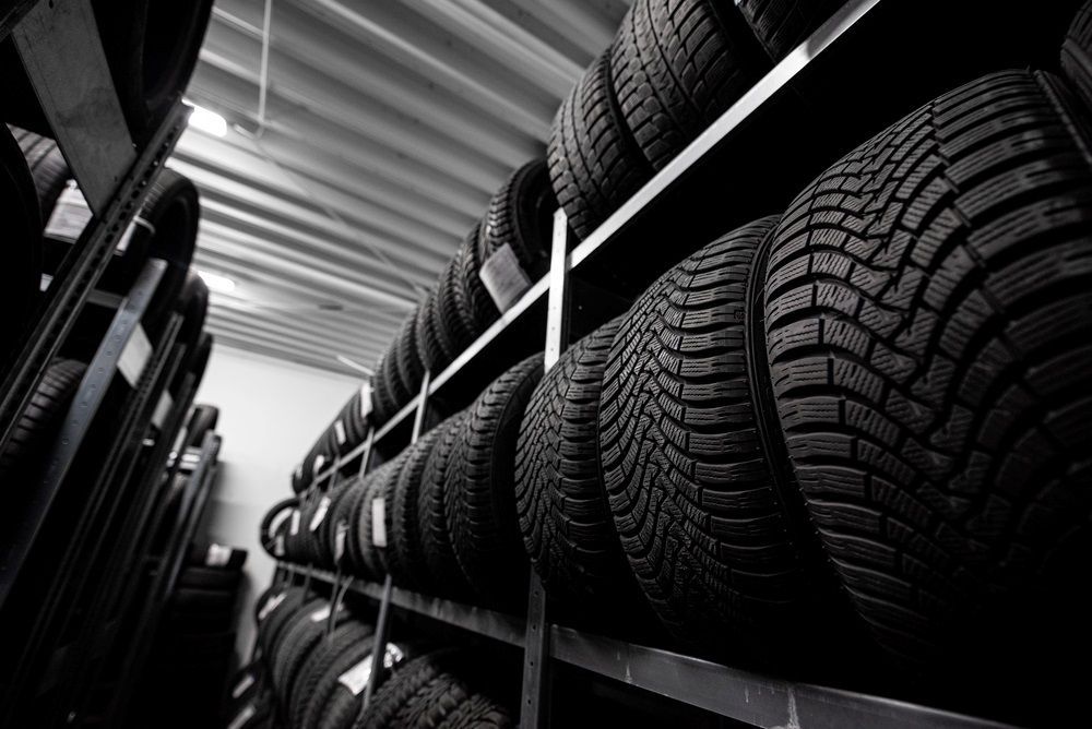 A Warehouse Filled With Lots of Tires on Shelves — Rycam Automotive in Buderim, QLD